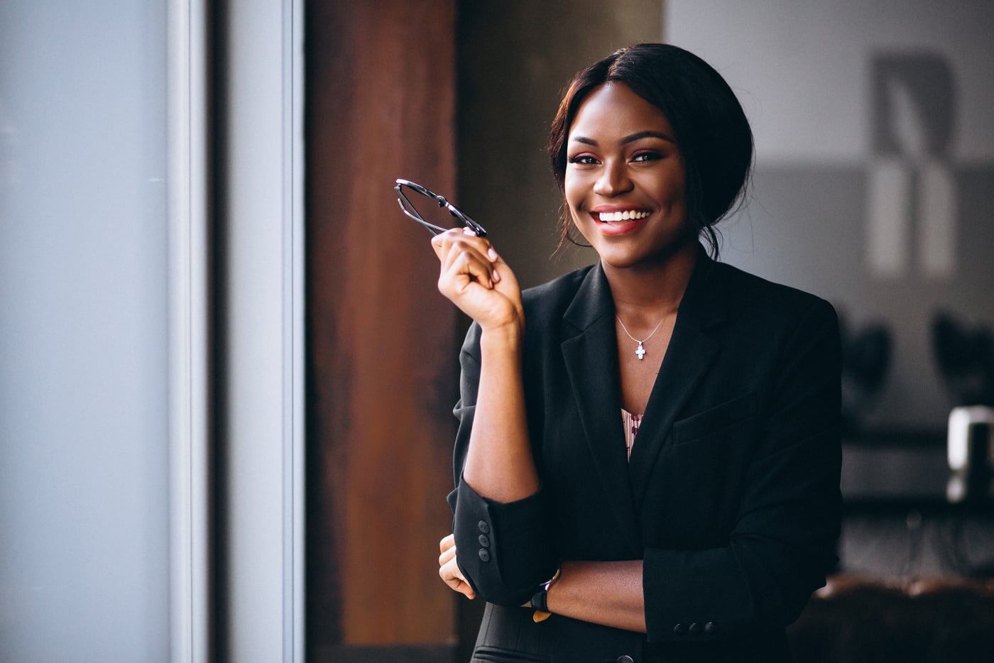 African American Business Woman by the Window